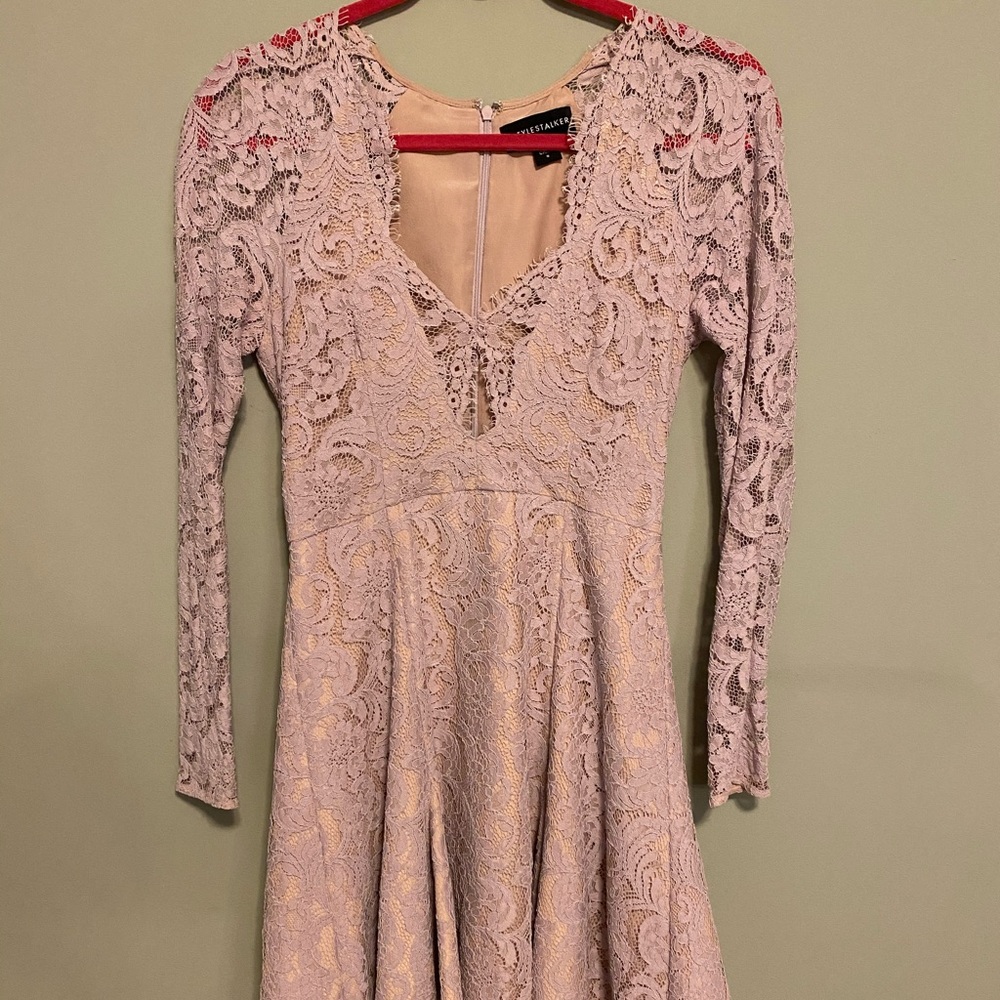 STYLESTALKER cream and violet colored dress.